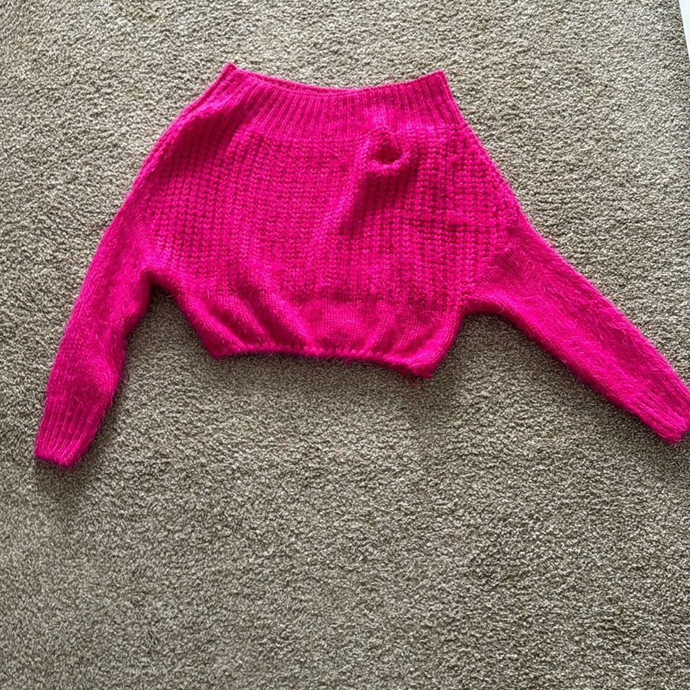 Pink off the shoulder crop sweater.